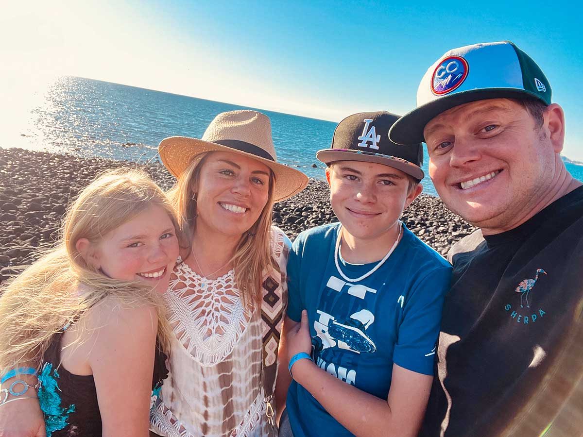 Osha Justice with her family at the beach
