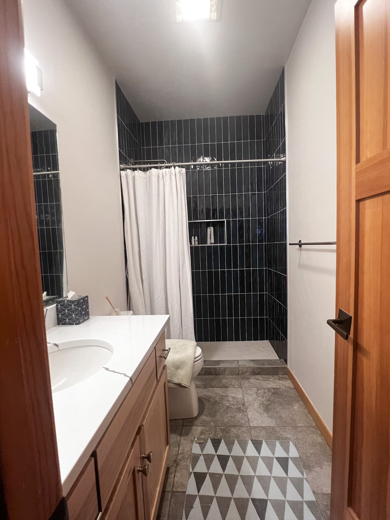 Guest bath blue subway tile