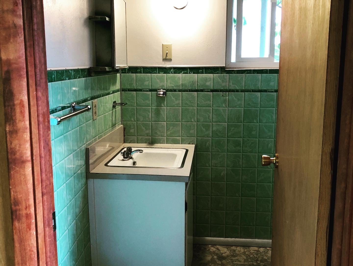 Before: outdated bathroom vanity