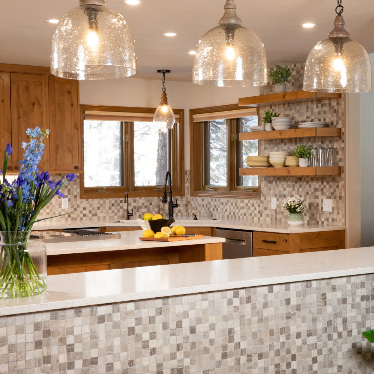Iron King kitchen after remodel — custom cabinetry, open shelving, mosaic tile backsplash